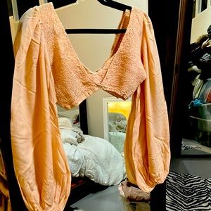 Indah cropped blouse size S/M worn once.  Peach color perfect condition